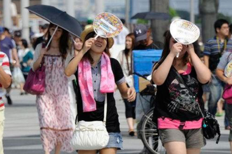 Ola de calor y tifón Shanshan coinciden en Japón