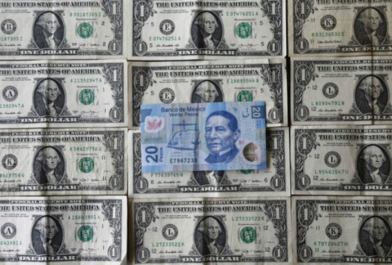 Peso se fortalece ante el dólar tras elecciones