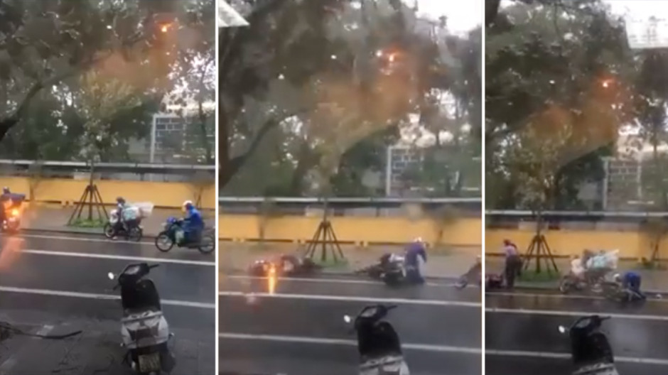 Fuertes vientos del tifón derriba a motociclistas