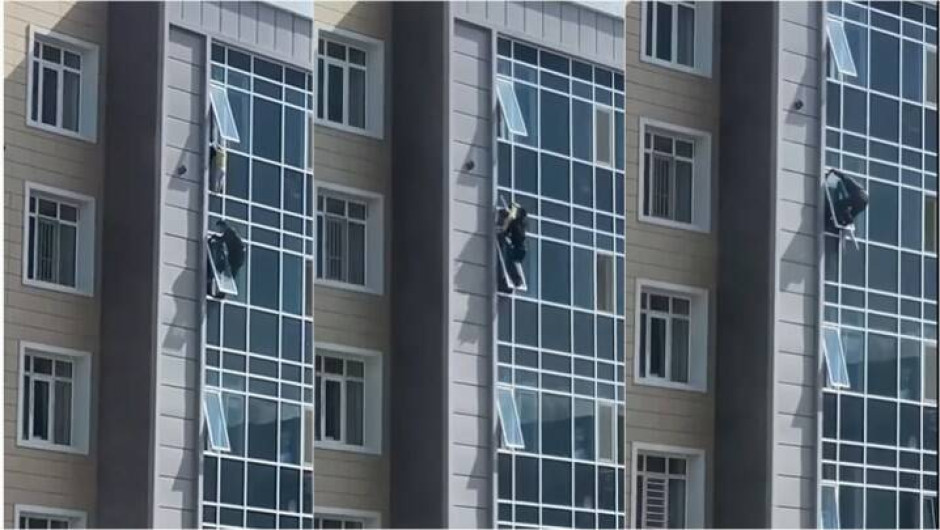 Héroe salva a niña de caer de un edificio 