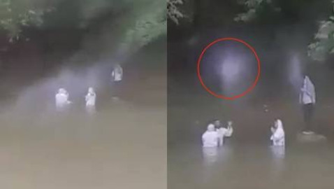 Captan supuestos ángeles en ceremonia de bautizo