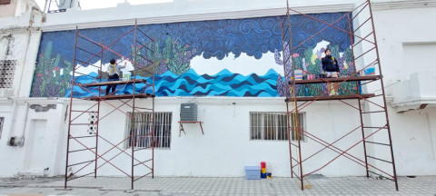 Pintan mural por Día de Muertos 