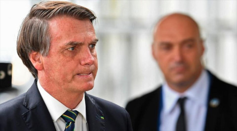 "Qué ganas de reventarte la boca a golpes", dice Bolsonaro a periodista