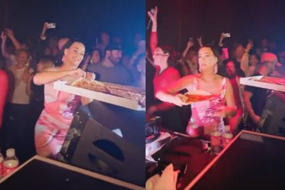 Captan a Katy Perry aventando rebanadas de pizza en un antro