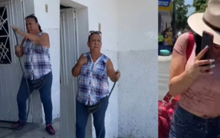 Mujer baña a manguerazos a turistas por pararse en su banqueta