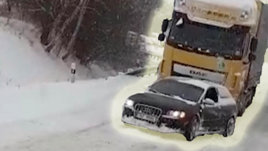 Audi remolca camión atorado en la nieve