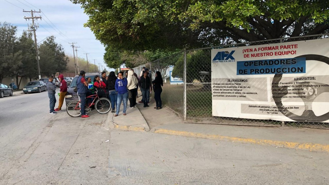 Obreros de AFX logran auto salarial y pago del bono 