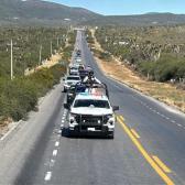 Escolta Guardia Estatal caravana de 250 veh&iacute;culos de paisanos en la Carretera Federal 101