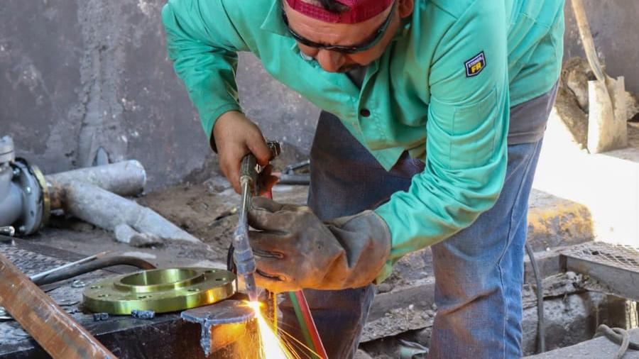 Mejora Comapa eficiencia de pluvial con trabajos de mantenimiento en el paso a desnivel no. 1