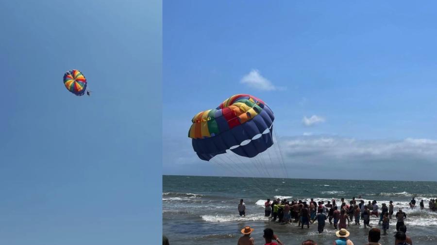 Turista queda suspendido en el aire con parachute en la playa