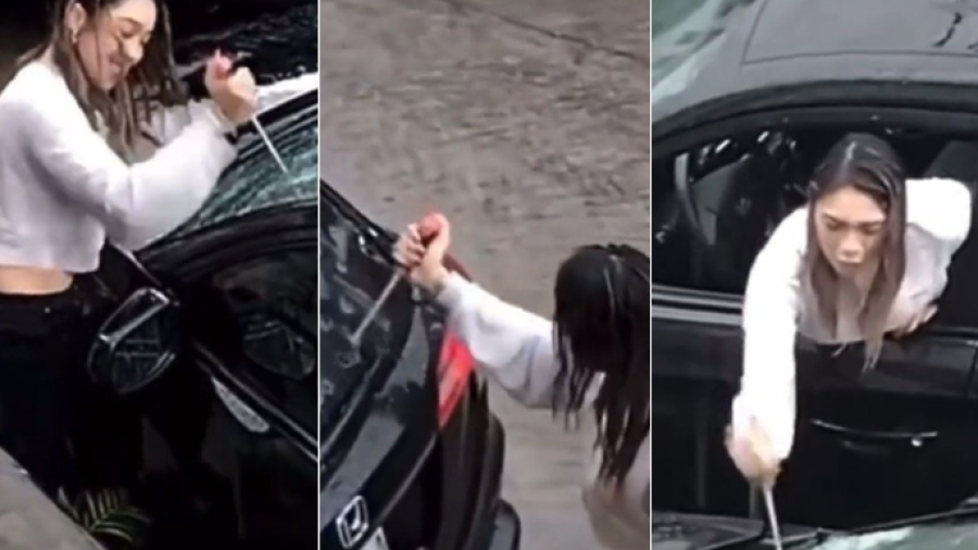 Mujer destroza auto de su pareja por supuesta infidelidad 