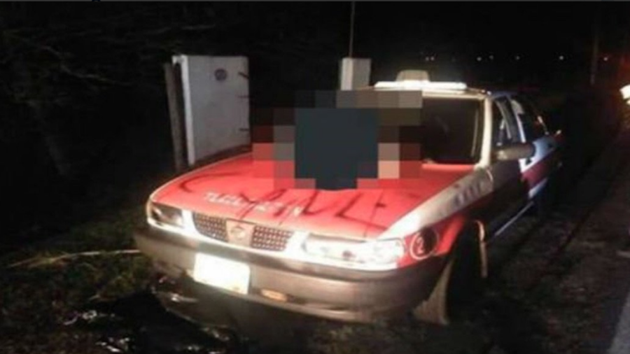 Hayan cuerpos desmembrados sobre taxi en Veracruz