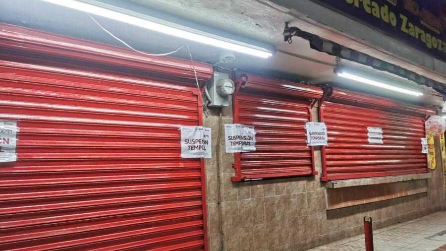 Suspenden actividades de negocios por tirar grasa y basura
