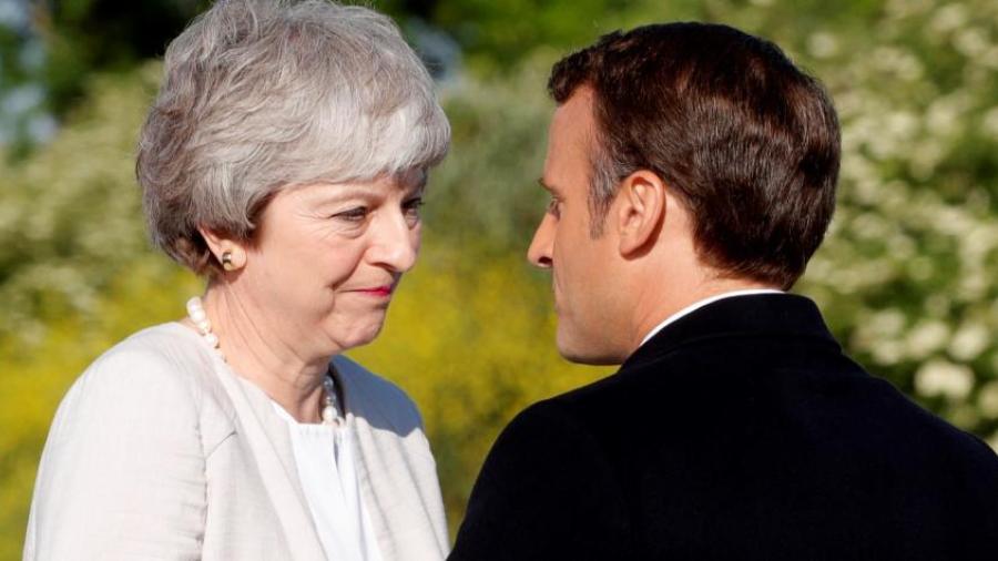 May y Macron rinden homenaje al "valor" de los veteranos del Dia-D 