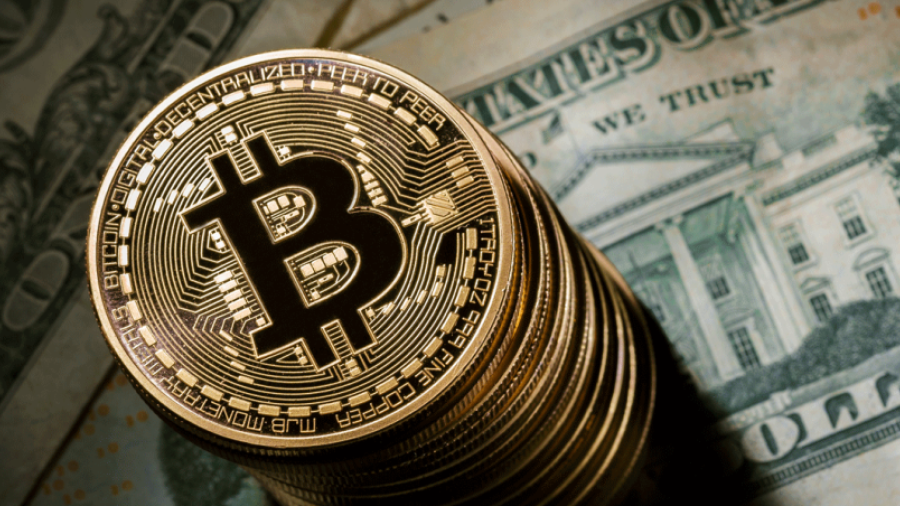 Bitcoin llega a los 11.000 dólares