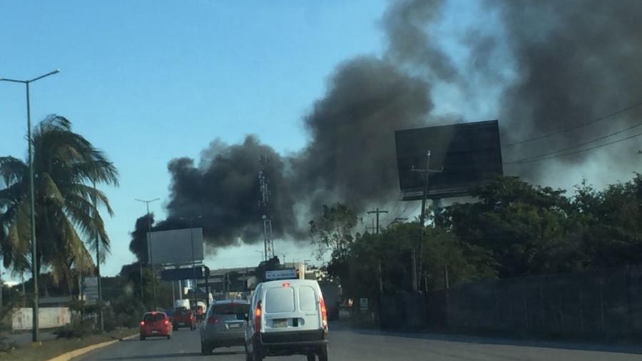Quema de llantas amenaza con incendiar bodegas