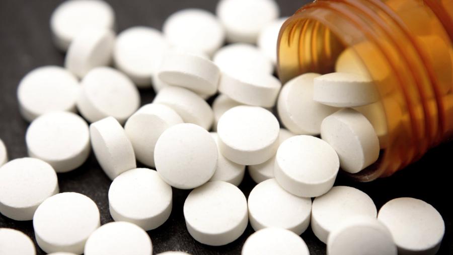 Aspirina adecuado para el combate de las caries